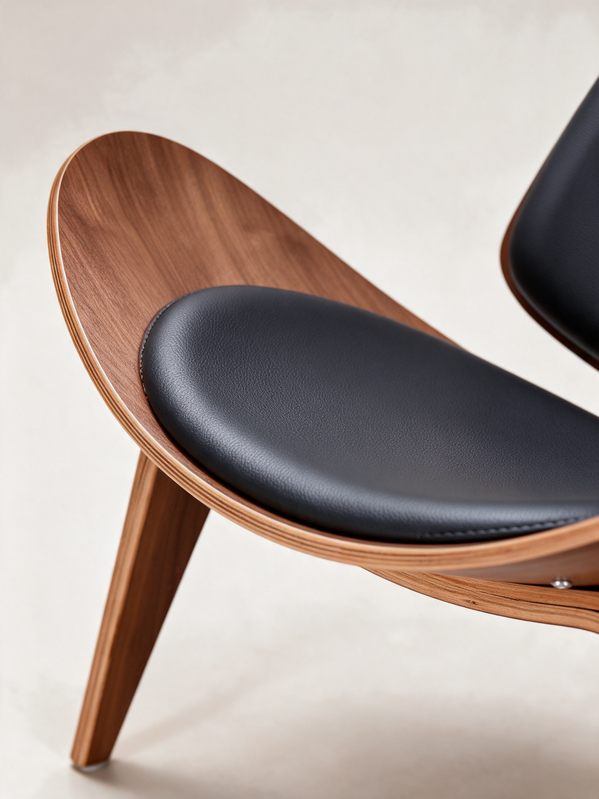 NIORA Walnut lounge chair, upholstery and construction detail