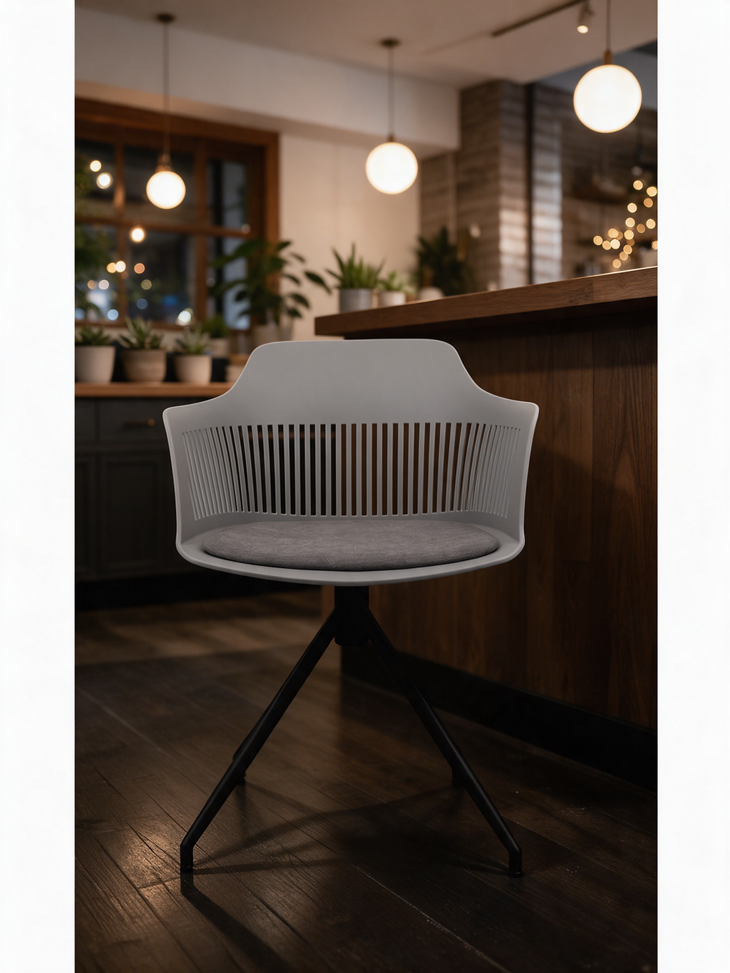 NIORA The Sip cafe chair in a modern cafe in warm evening light